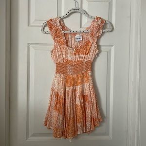 Sky to moon bought from a boutique orange bandana print romper